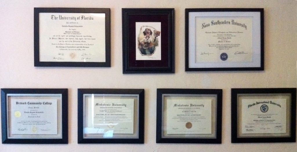 Asenath Waite with our Miskatonic and other school Certificates and Diplomas